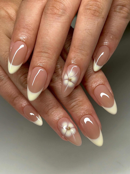 Blooming gel French nails with floral design